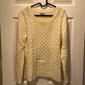 Classic cableknit sweater. A staple for any wardrobe